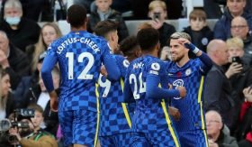 Chelsea players celebrate scoring against Newcastle United