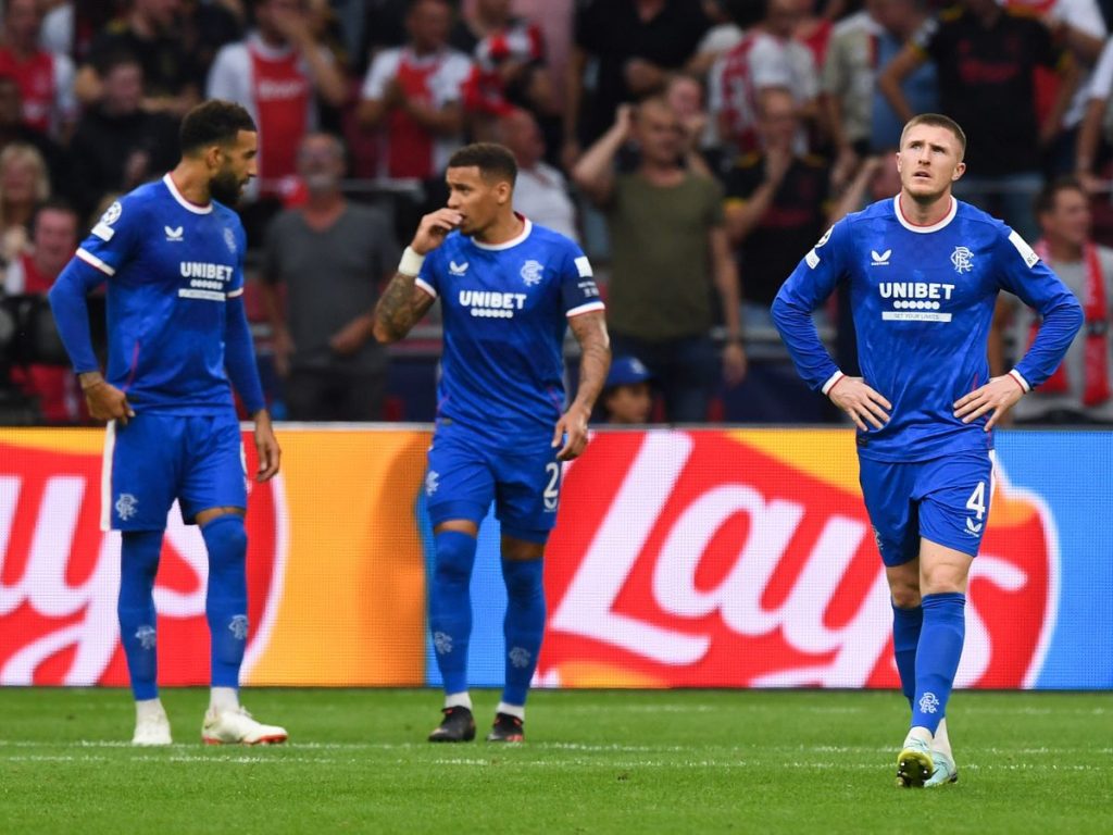Rangers players look disappointed walking back to the centre-circle after conceding in the Champions League to Ajax last week.